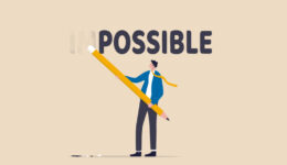 Make it possible, erase im word from impossible and believe we can do it, challenge or hope to overcome difficulty and achieve success concept, businessman using eraser to delete im from impossible.