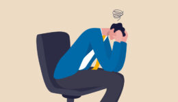 Regret on business mistake, frustration or depressed, stupidity or foolish losing all money, stressed and anxiety on failure concept, frustrated businessman holding his head sitting alone on the chair