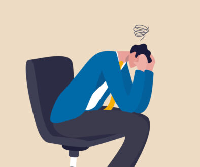 Regret on business mistake, frustration or depressed, stupidity or foolish losing all money, stressed and anxiety on failure concept, frustrated businessman holding his head sitting alone on the chair